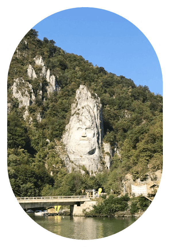 A large rock face on the side of a mountain.